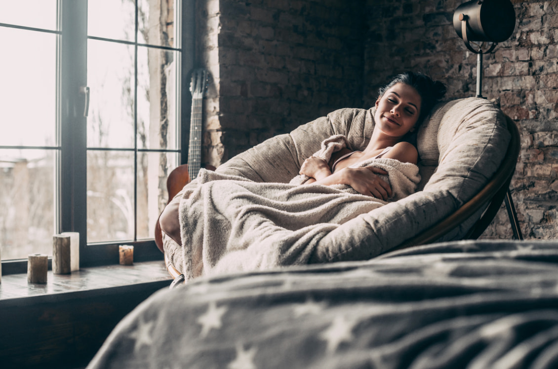 Lady relaxing in a chair