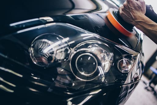 Car,Detailing,-,Hands,With,Orbital,Polisher,In,Auto,Repair Auto Detailer, Detailing, Wax, Wash, Buffer, Nasiol, Buffing, Sports Car, Auto Detail, Fort Collins, Loveland, Longmont